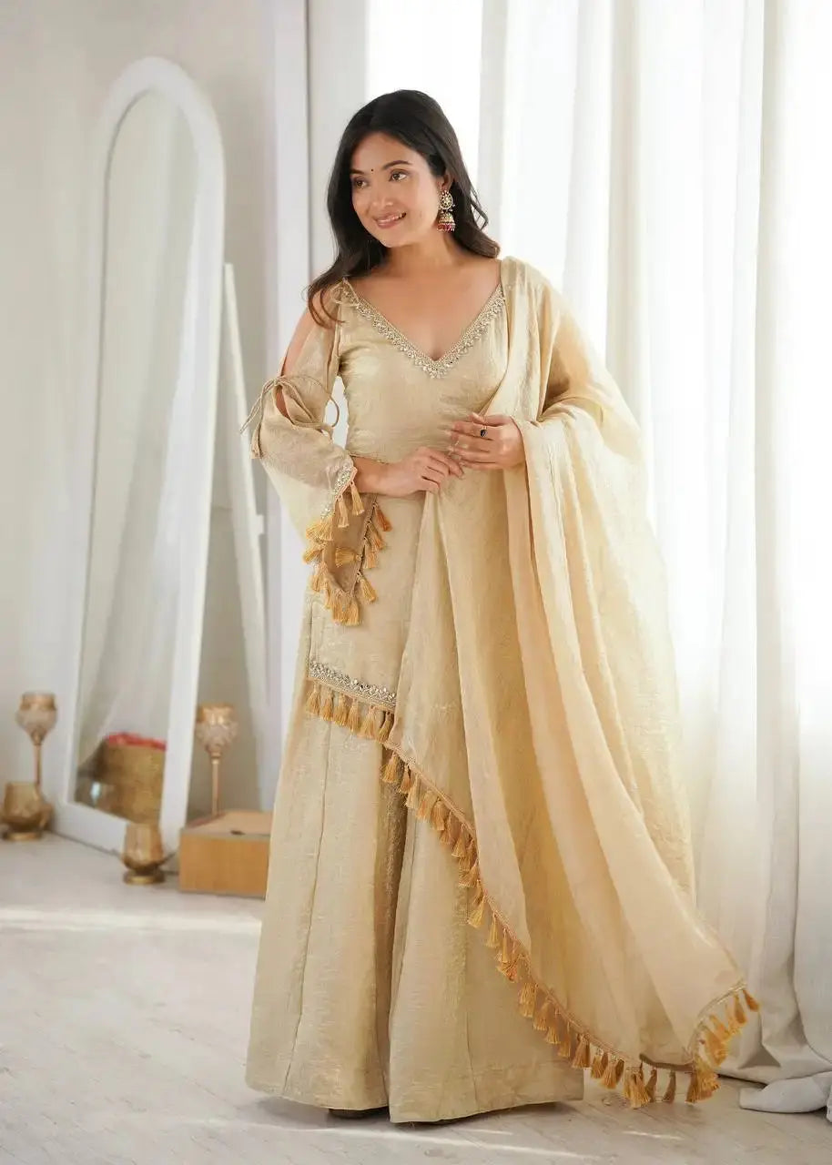KU212 Beige Mirror Work Suit – Full-length shot with model smiling, cold shoulder bell sleeves with tie-up cuffs and tassel fringe dupatta