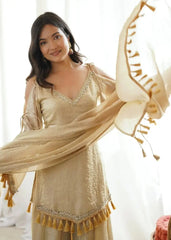 KU212 Beige Mirror Work Suit – Portrait close-up with model holding dupatta up, showing V-neck mirror work and cold shoulder straps