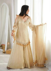 KU212 Beige Suit – Side/back three-quarter view showing cold shoulder strap detail, bell sleeves and tassel-trimmed dupatta