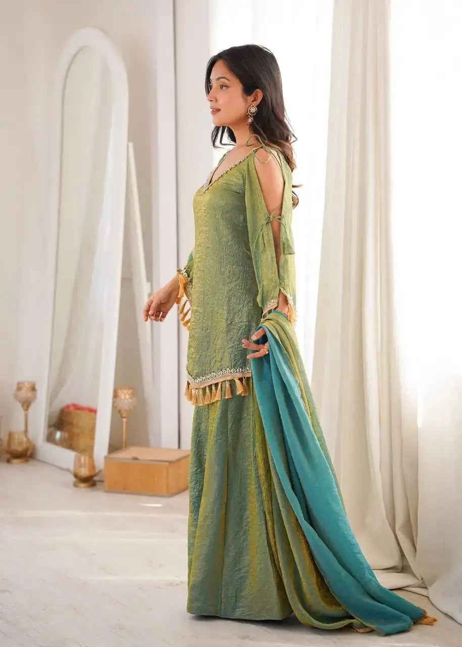 Green Suit – cold shoulder strap and dori tie-up attachment close-up