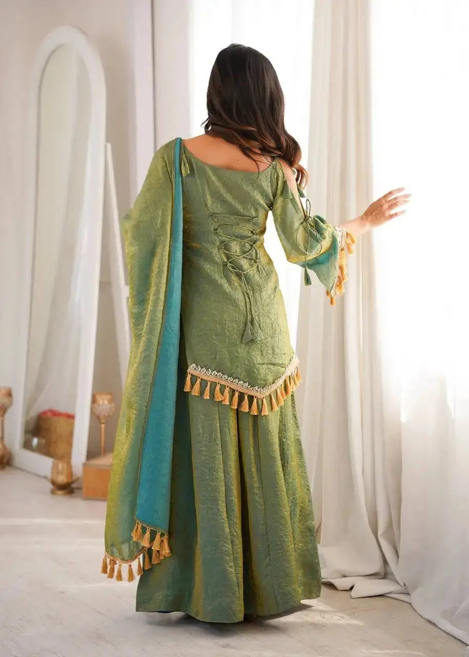 Green Mirror Work Suit – tassel border hem and mirror work hem detail close-up