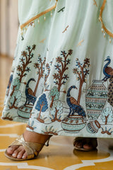 Close-up of peacock and tree embroidery on hem border – Pastel Green Anarkali Suit KU214