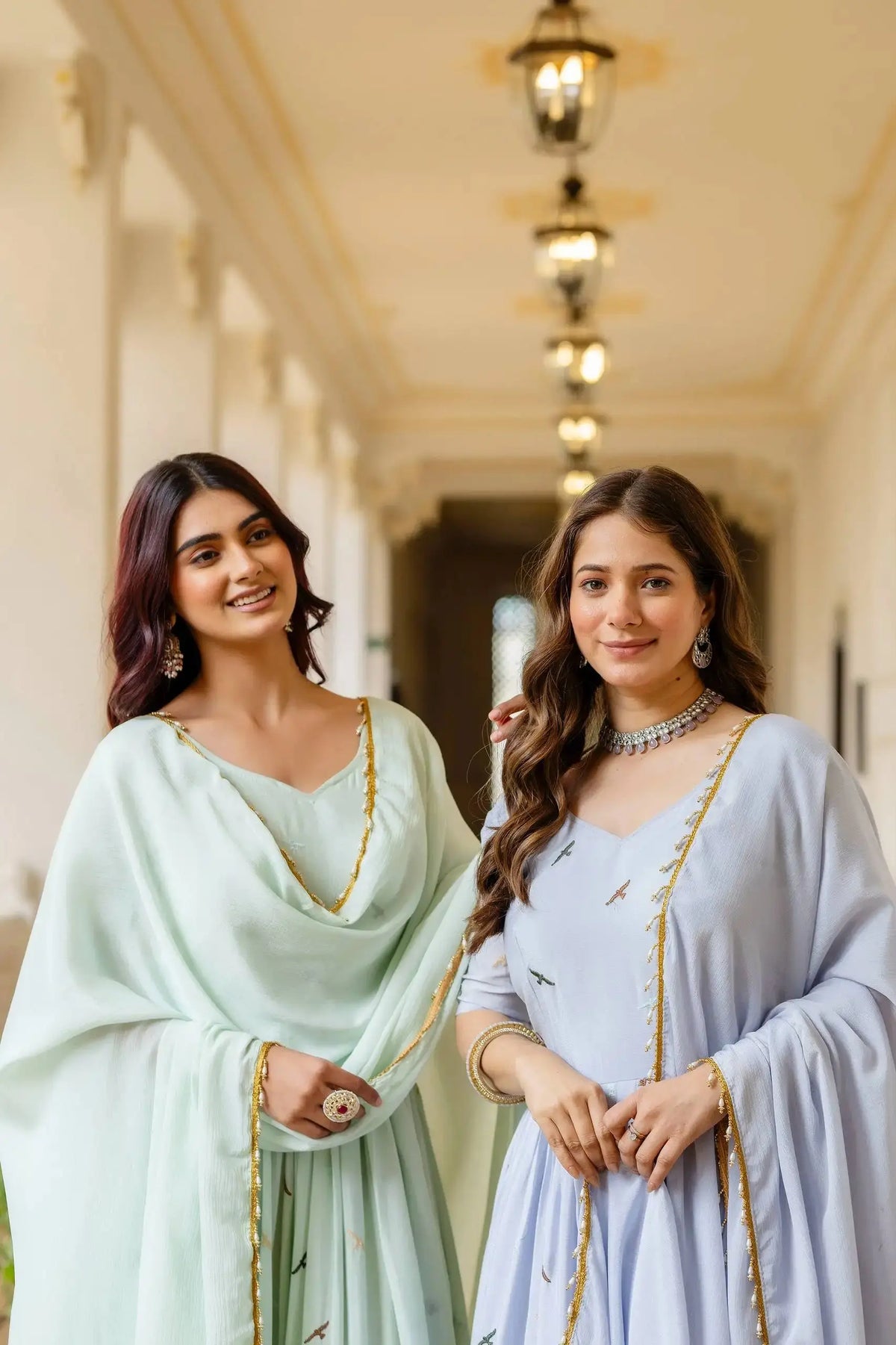 Close-up portrait of Anarkali Suit models – Pastel Green and Blue | Kalyanja