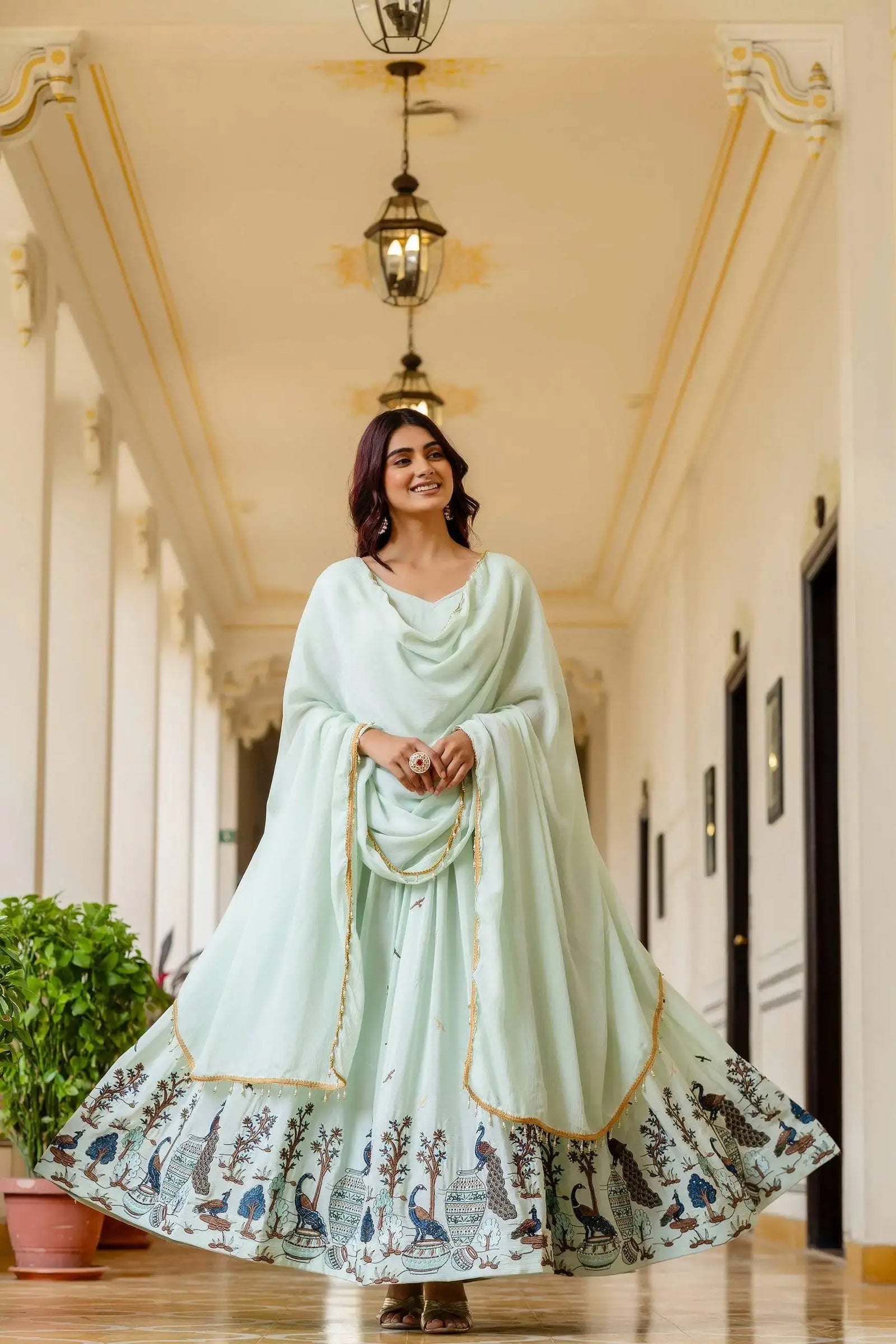 Side view of Pastel Green Anarkali Suit with gold zari border dupatta – Kalyanja