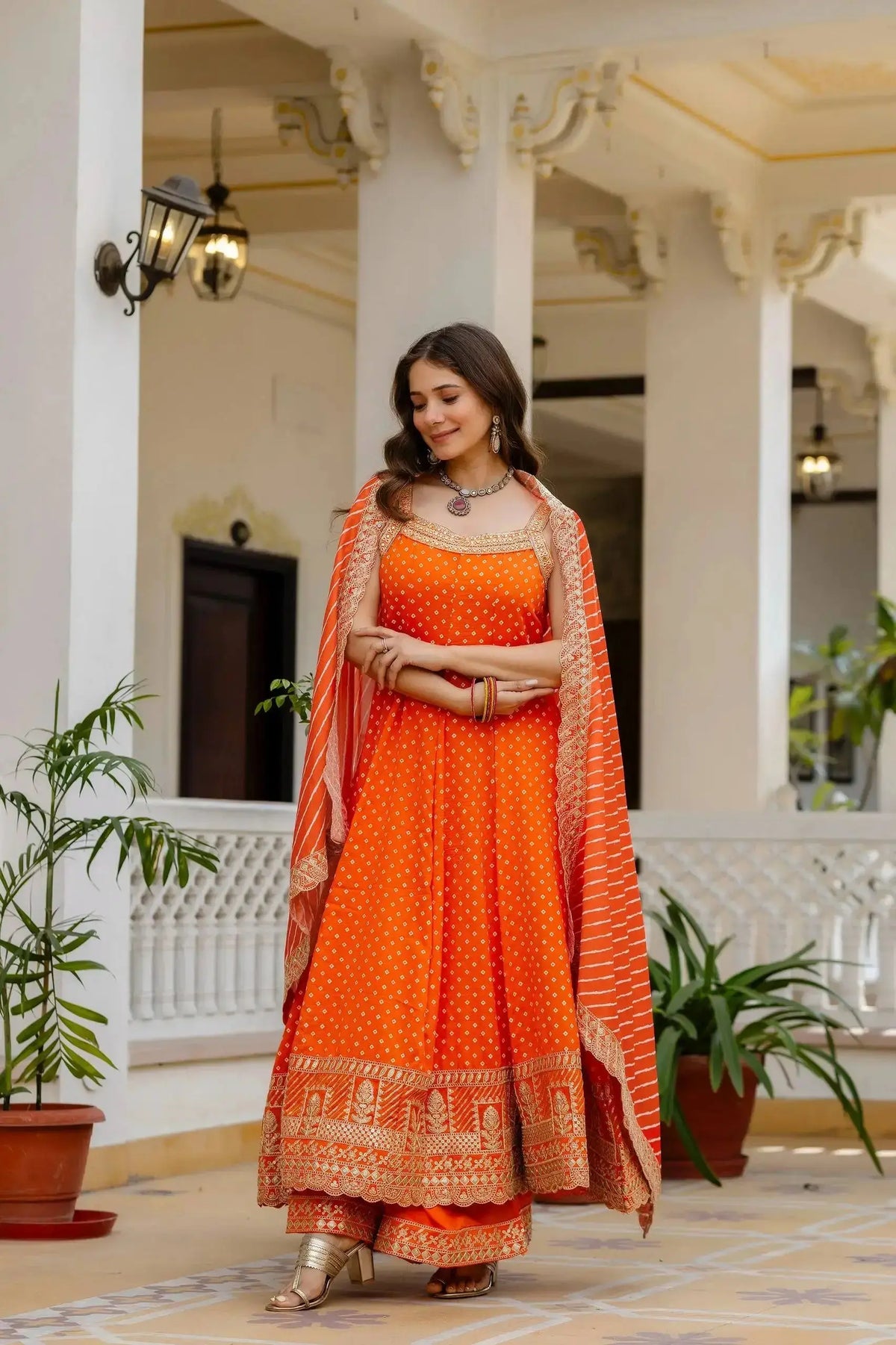 Orange Suit – mirror work and sequins close-up on yoke panel