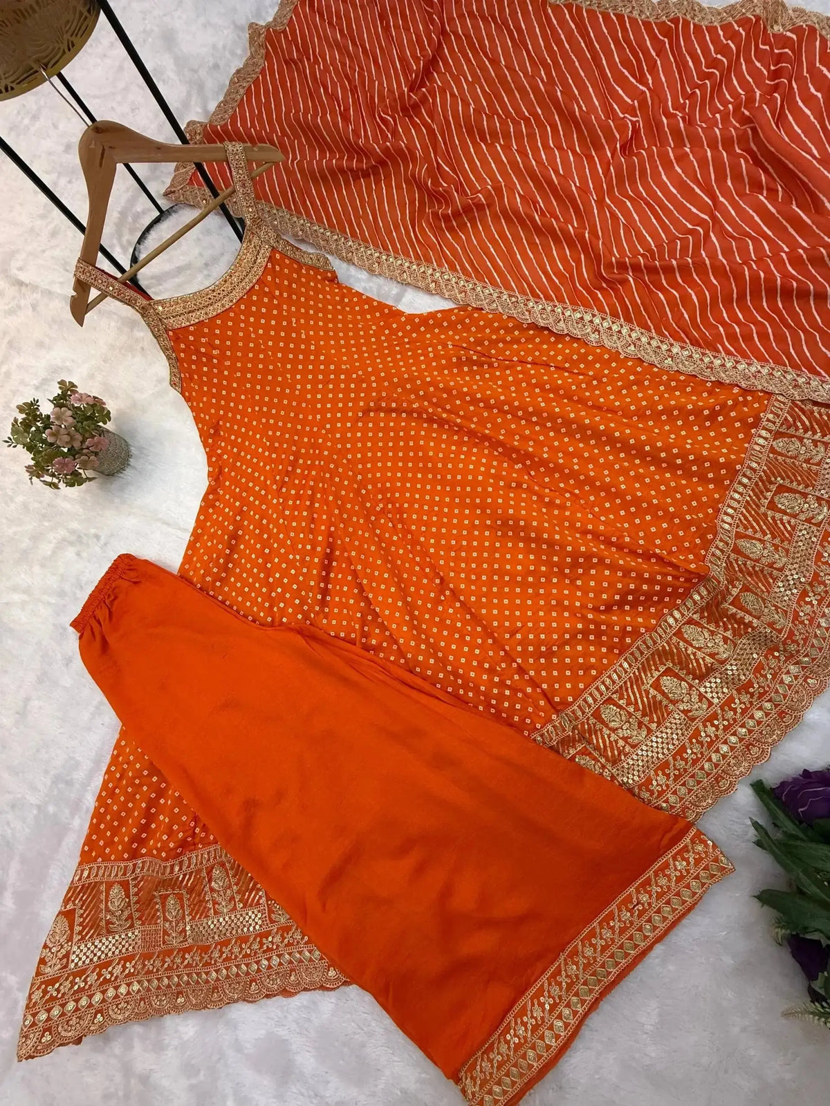 Orange Embroidered Anarkali Suit flat lay – suit, Palazzo and Striped Lurex dupatta