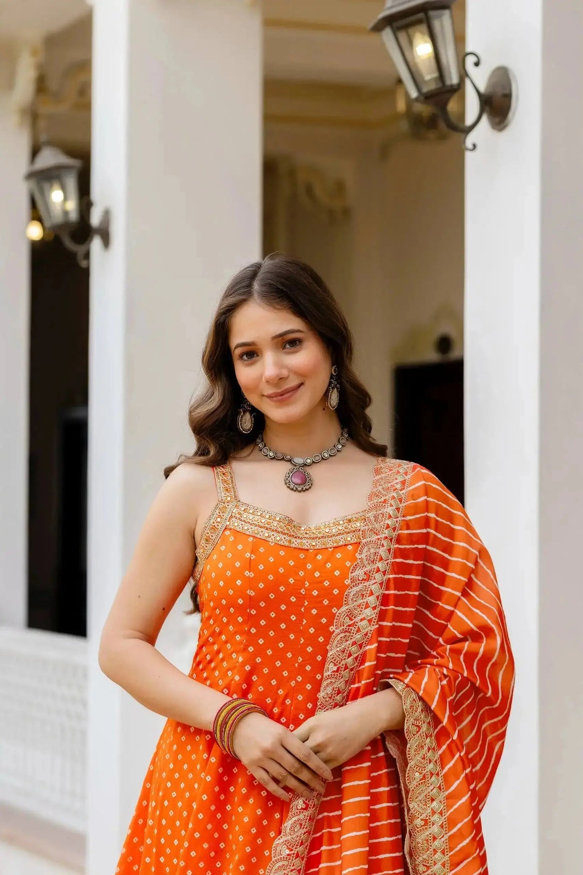 Orange Embroidered Suit – side view showing silhouette and dupatta drape