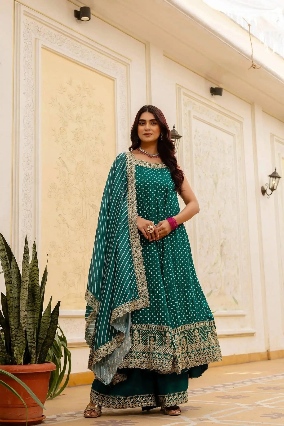Teal Green Suit – gold zari temple border detail at hem