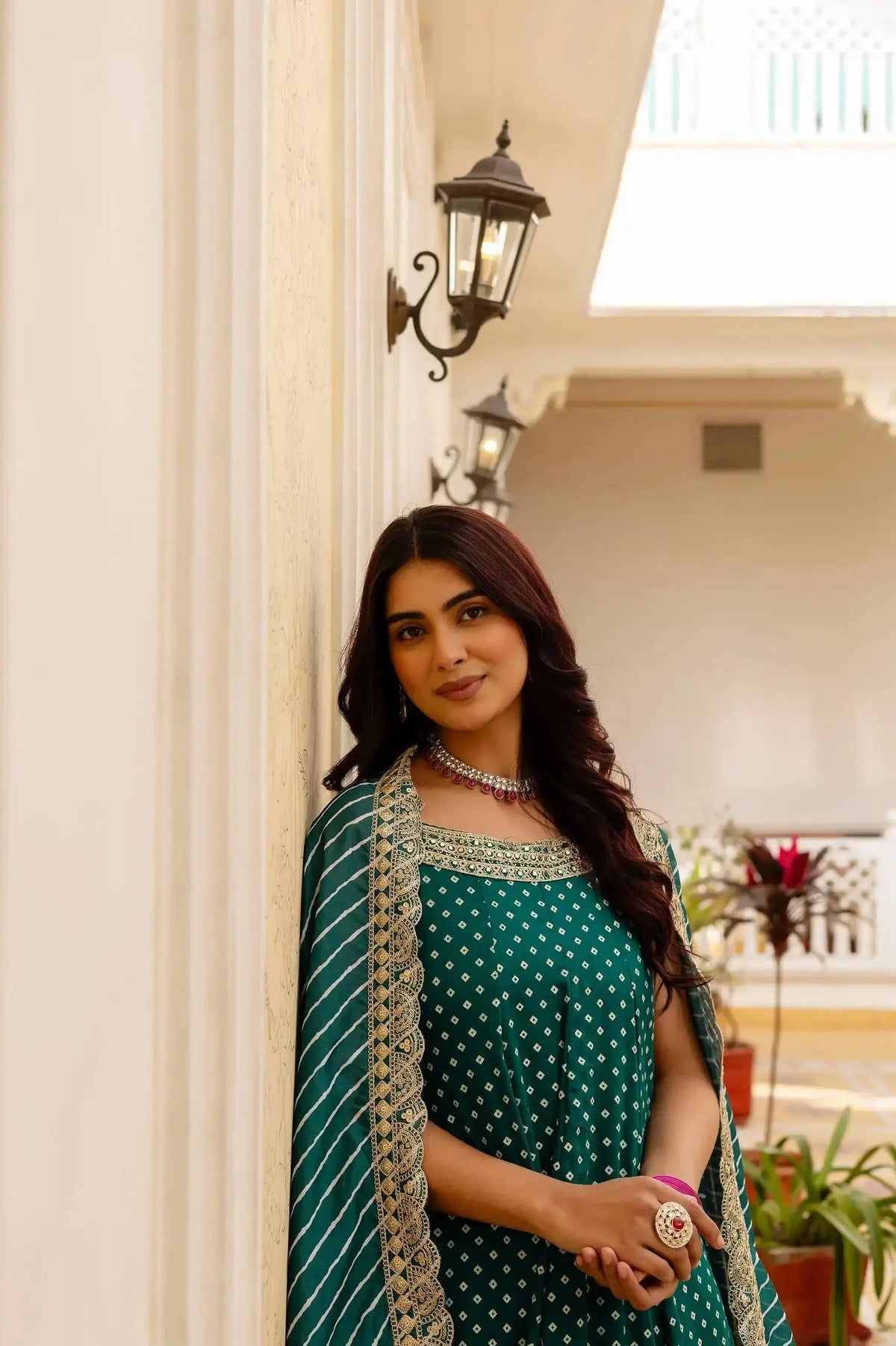 Teal Green Anarkali Suit – close-up of gold mirror work and sequins on yoke