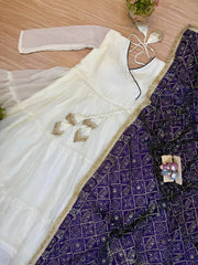 White Anarkali Suit flat lay – suit and purple Bandhej embroidered dupatta with gold border
