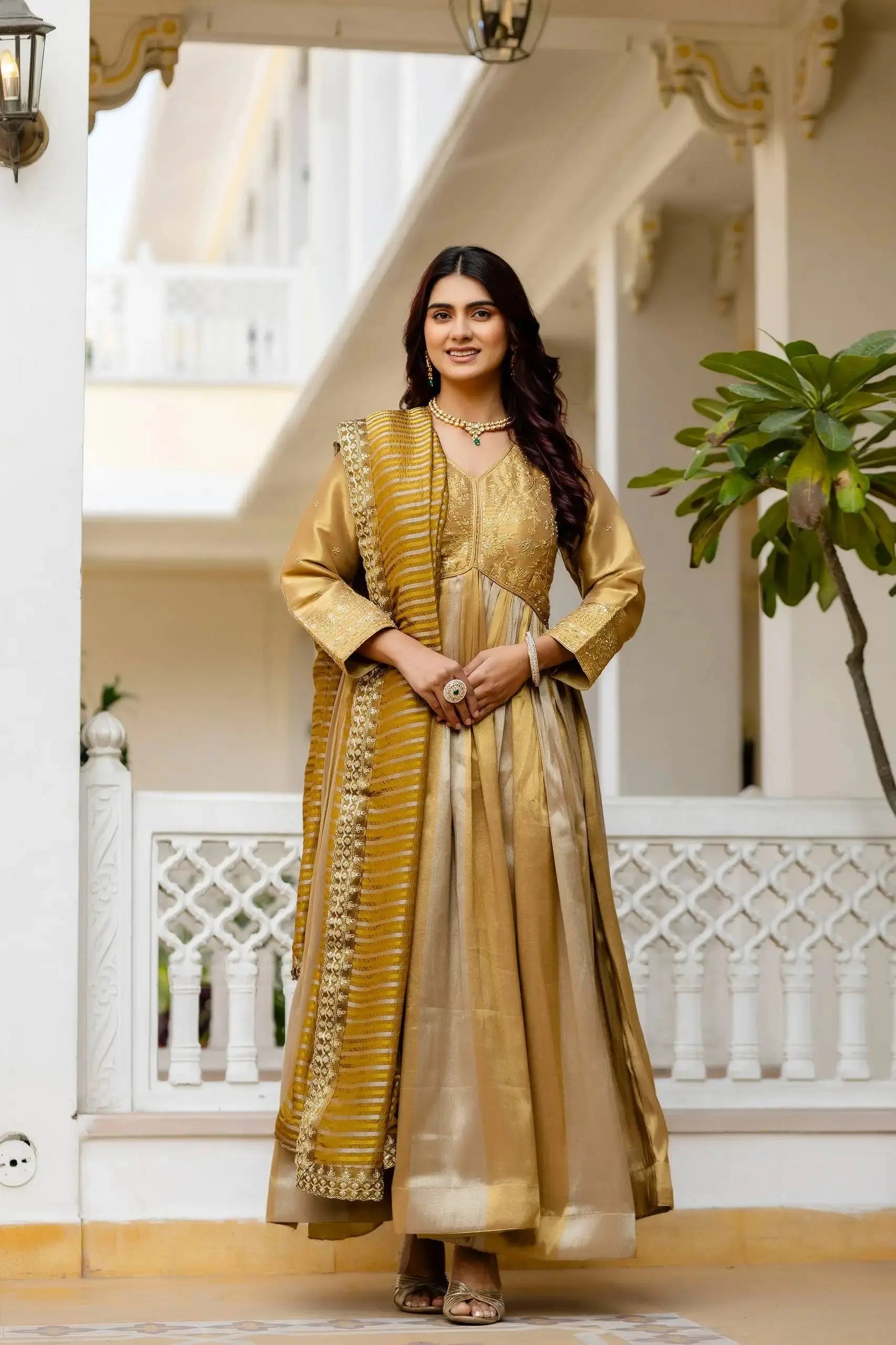 KU218 Beige Anarkali Suit – Full-length front with mustard striped dupatta, V-neck and embroidered cuffs visible