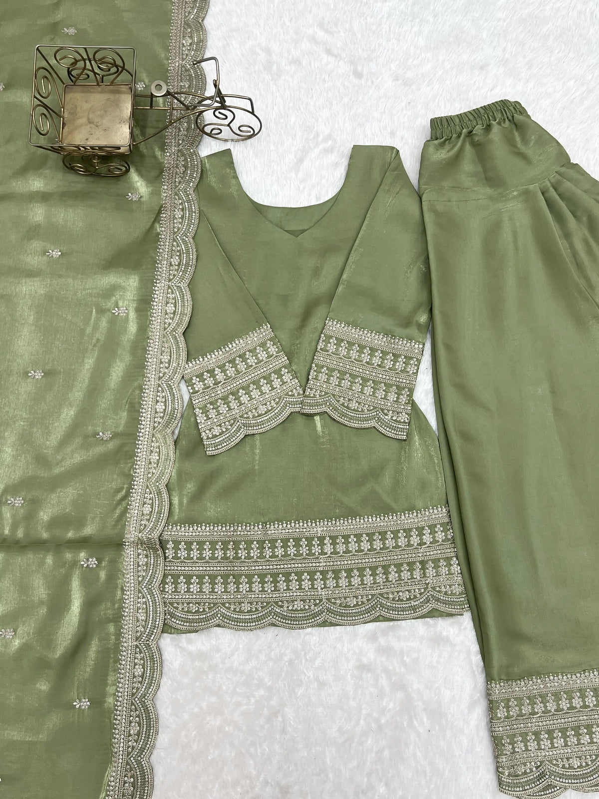 Pista Green Suit – close-up of zari and sequin scalloped hem border embroidery