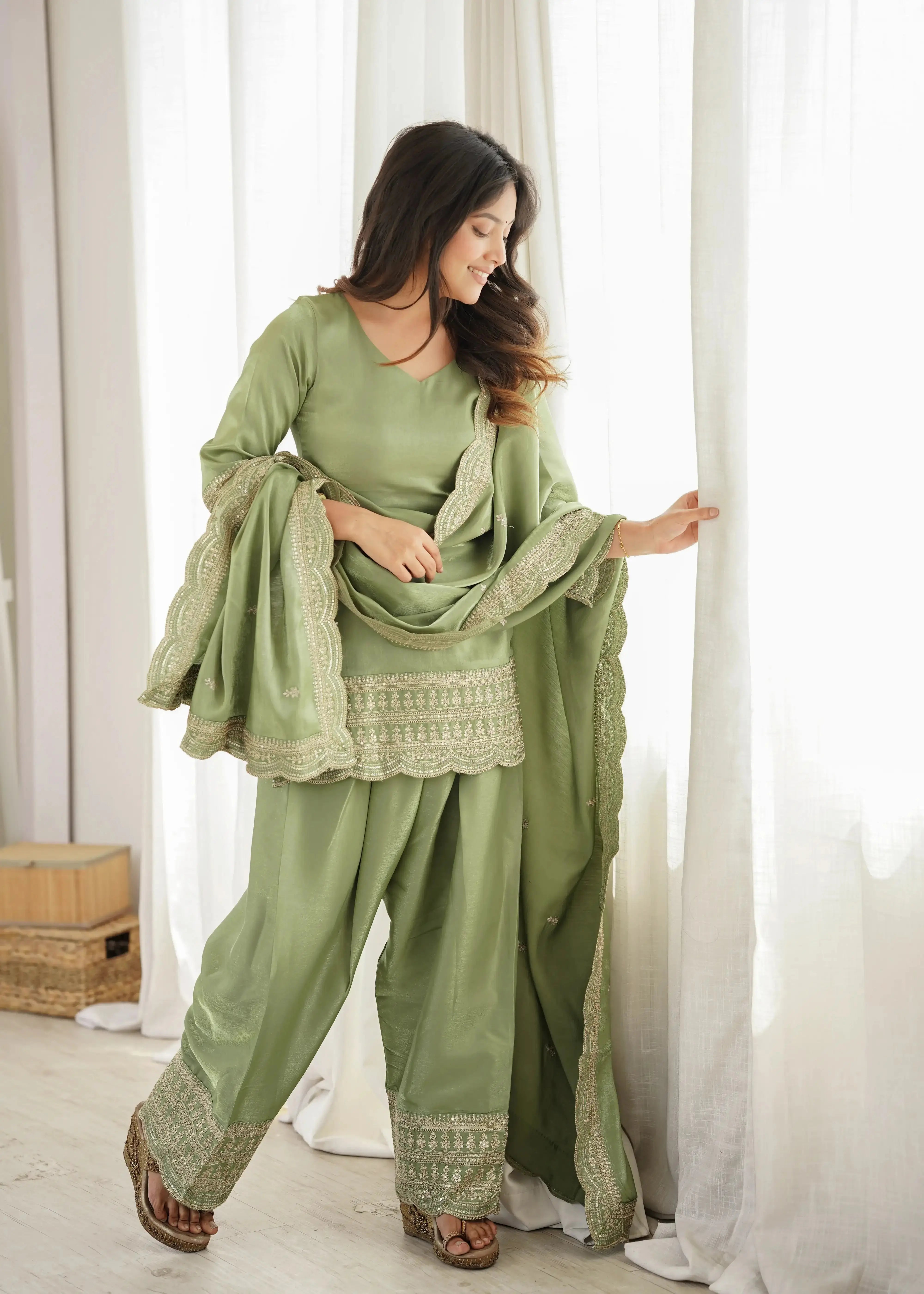 Pista Green Suit – full-length pose highlighting scalloped hem and shalwar silhouette