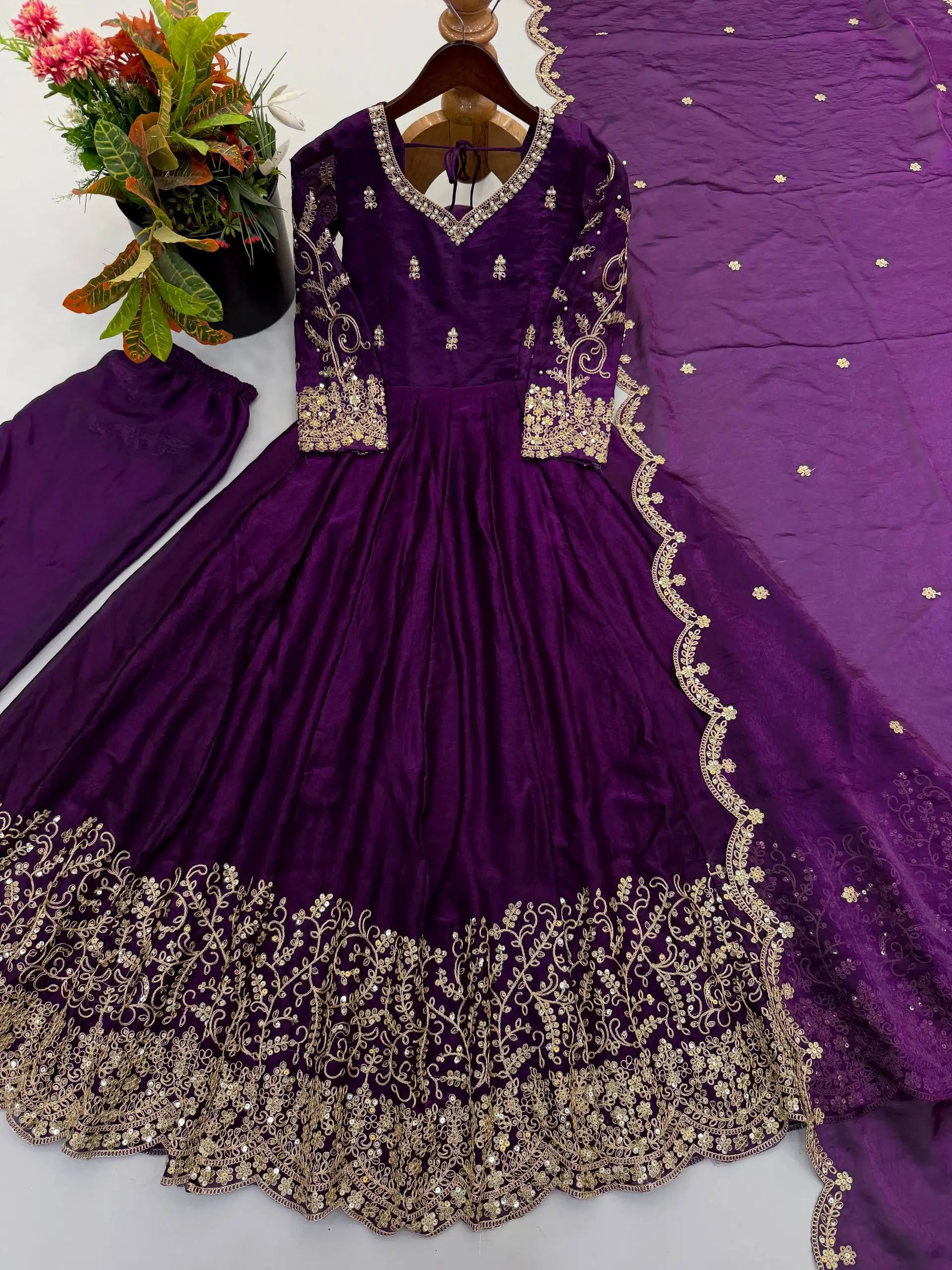 Purple Embroidered Anarkali Suit – full-length walking pose showing flair movement
