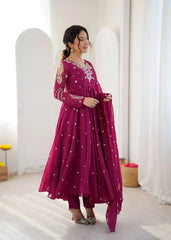 Magenta Suit – embroidered sleeve patch with cutwork detailing on upper arm