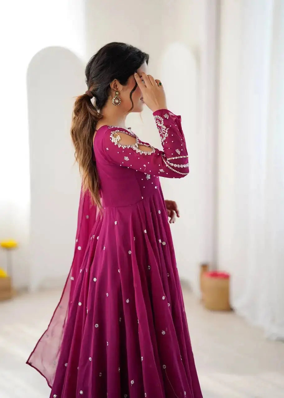 Magenta Suit – full-length third pose highlighting Anarkali flair and fancy neckline