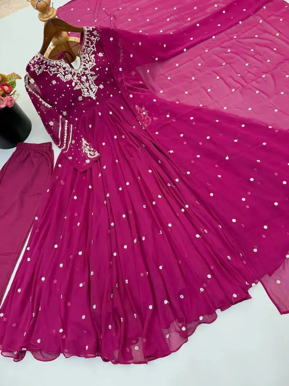 Magenta Embroidered Anarkali Suit – full-length walking pose showing flair movement
