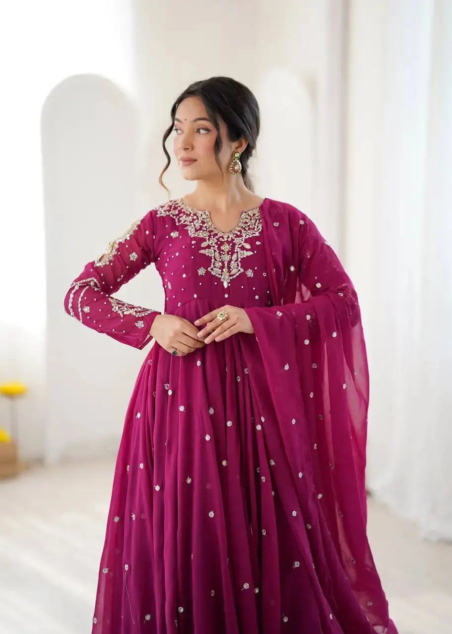 Magenta Embroidered Suit – side view showing Anarkali silhouette and dupatta drape