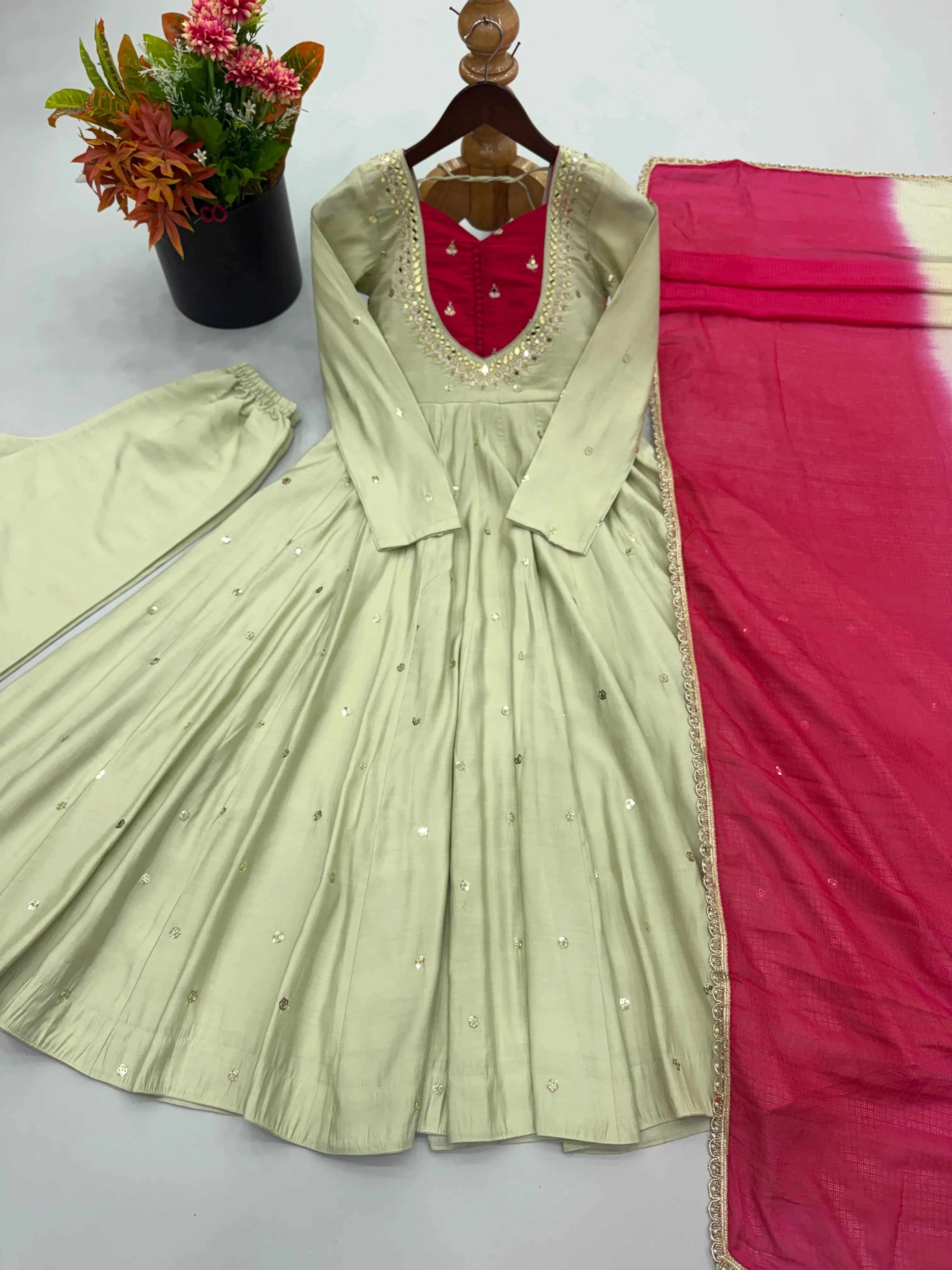 Light Pista Green Anarkali Suit – close-up of yoke embroidery and scalloped mirror work neckline