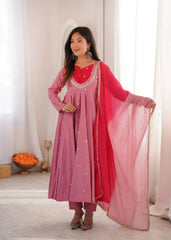 Pink Anarkali Suit – close-up of contrast yoke embroidery and scalloped mirror work neckline