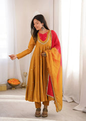 Yellow Anarkali Suit – close-up of contrast yoke embroidery and scalloped mirror work neckline
