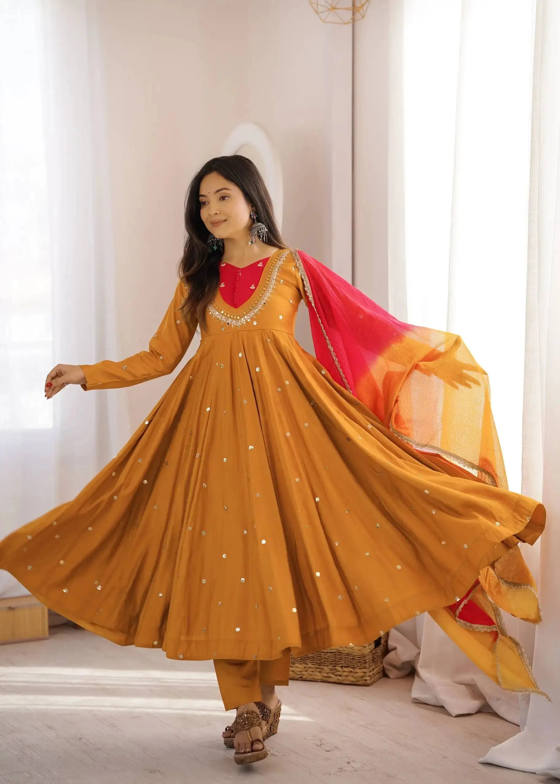 Yellow Suit – full-length angled pose showing contrast yoke and Anarkali volume