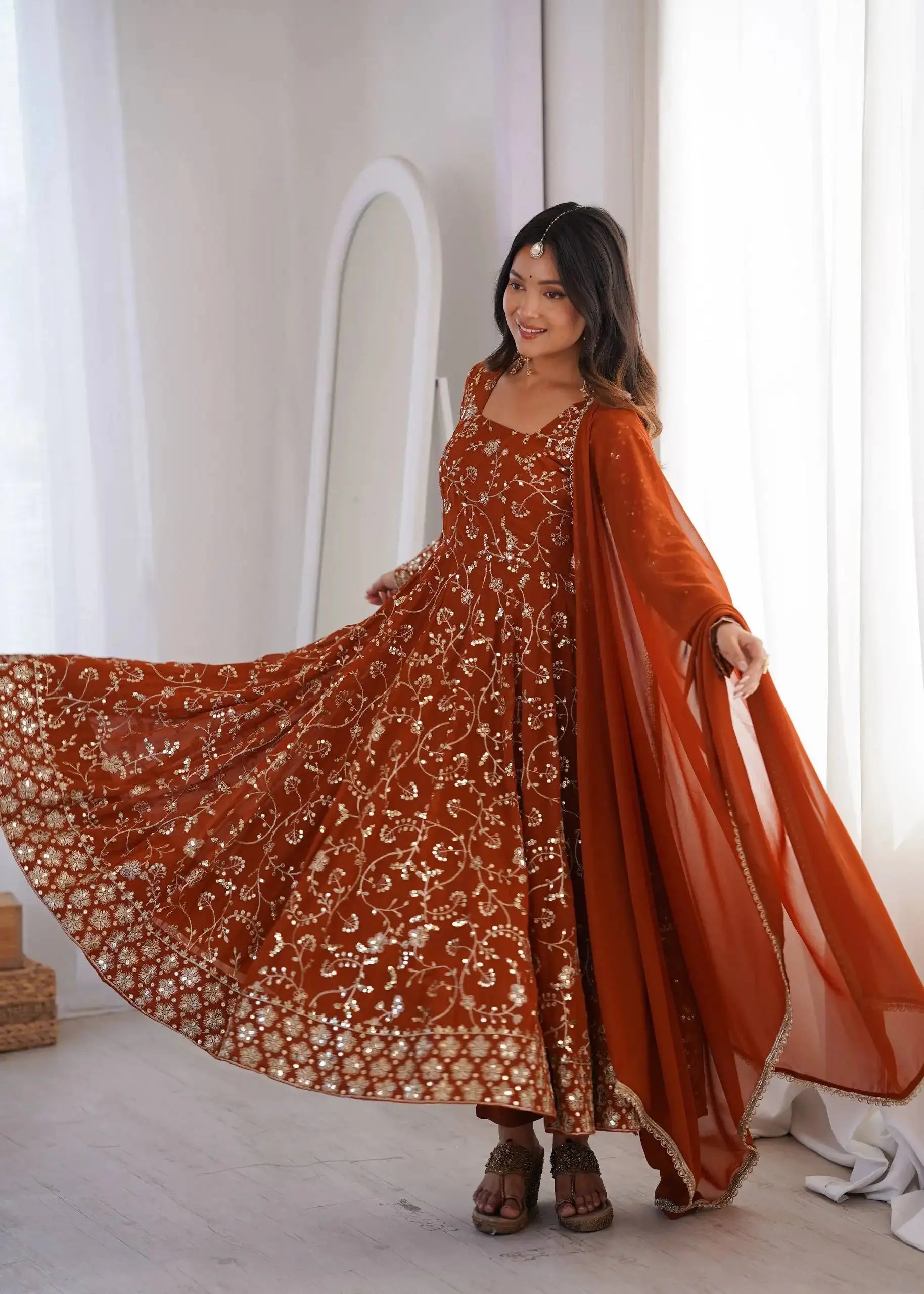 Orange All-Over Embroidered Anarkali Suit – Model Side View | Kalyanja