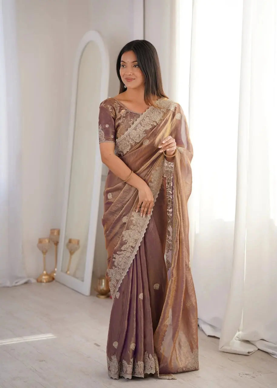 Lavender Pink Zari Embroidered Saree front view smiling and looking away