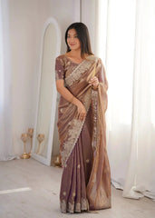 Lavender Pink Zari Embroidered Saree front view smiling and looking away