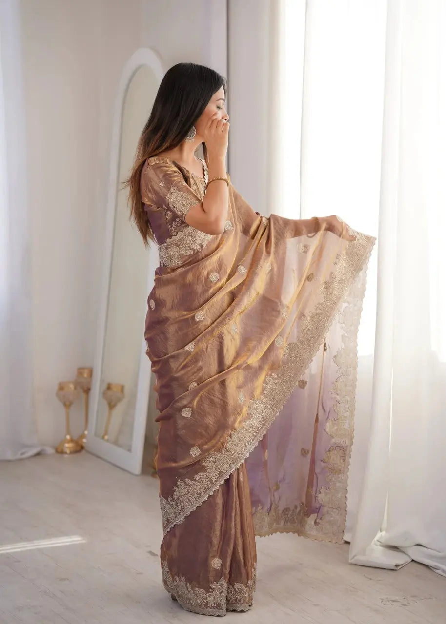 Lavender Pink Zari Embroidered Saree side view holding pallu near face