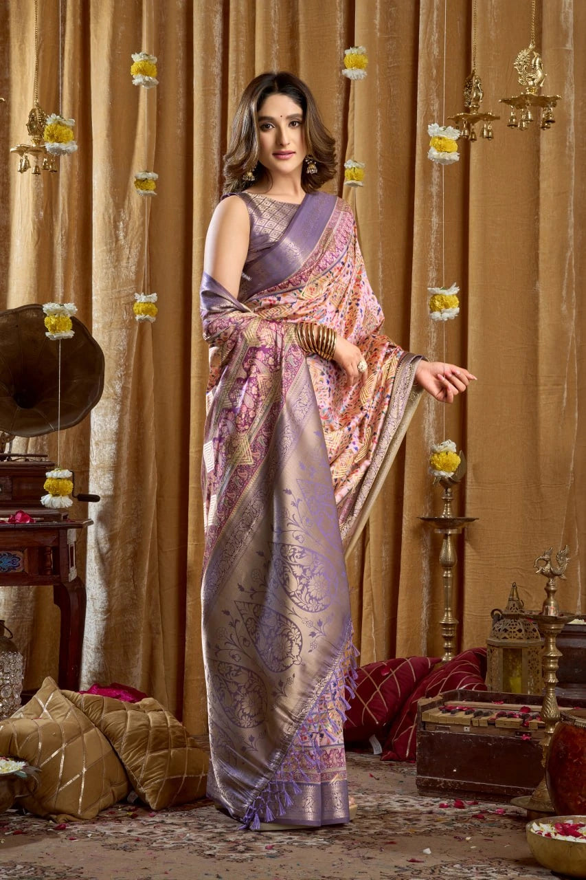 Woman in a saree standing in a decorated room with curtains and decorative items.