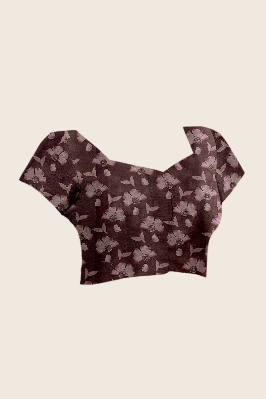 Floral patterned crop top on a beige background