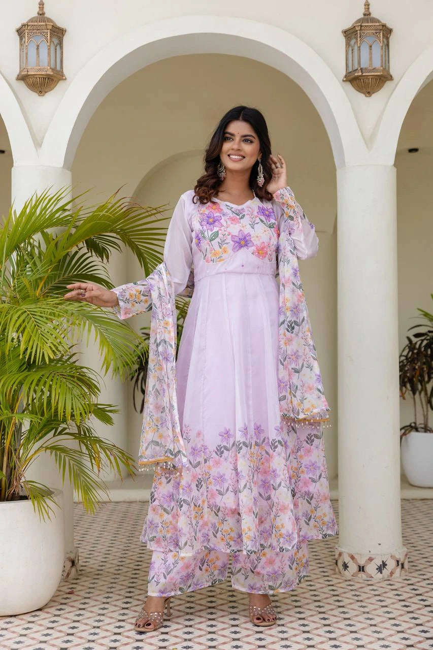Traditional pastel lavender embroidered Anarkali suit perfect for festive celebrations and special occasions.
