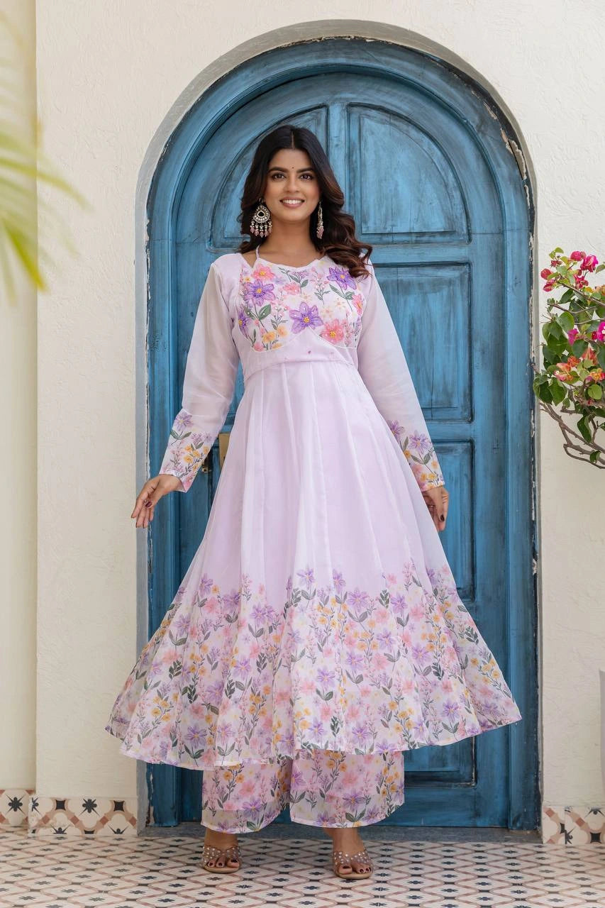Graceful lavender floral print Anarkali suit featuring embroidered bodice and elegant full sleeve design.