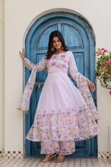 Women's embroidered lavender Anarkali suit set with floral palazzo pants and lightweight printed dupatta.