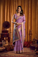 Woman in a pink saree with a vintage interior setting