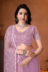 Sophisticated embroidered saree with sparkling embellishments, elegant drape, and premium finishing for a refined ethnic look.