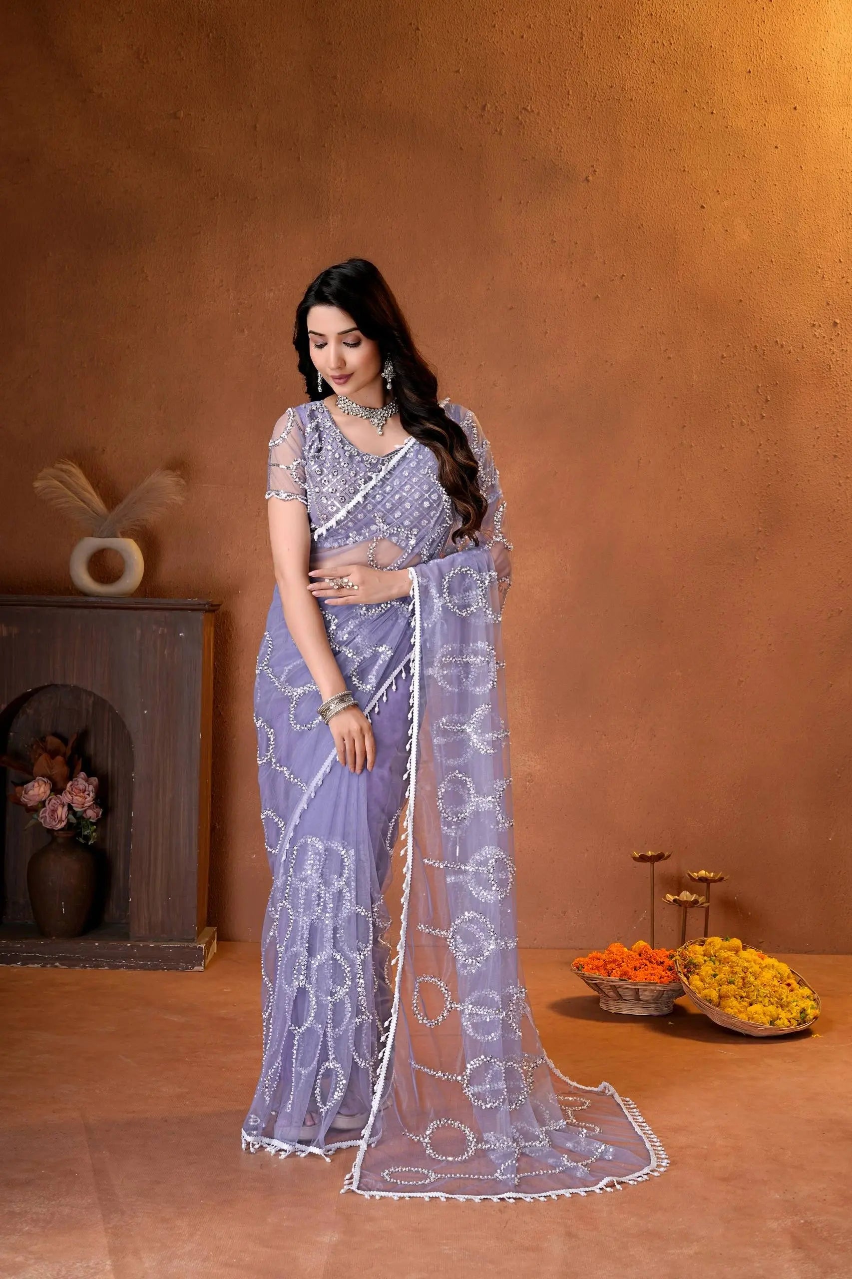 Perfect designer saree for weddings, receptions, engagement ceremonies, festive celebrations, and evening parties.