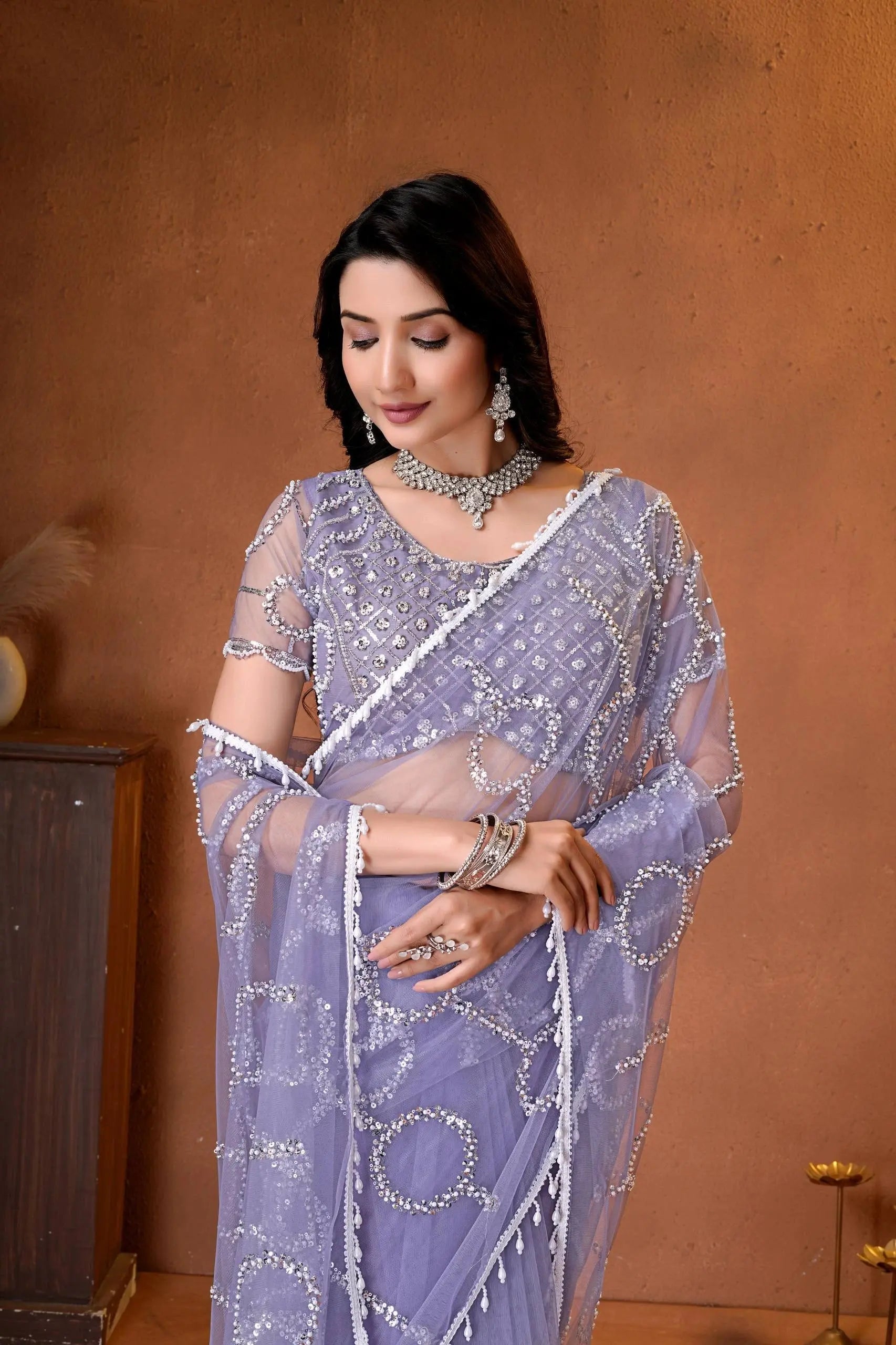 Beautiful Indian saree combining modern elegance, sparkling embroidery, and timeless ethnic fashion with premium finishing.
