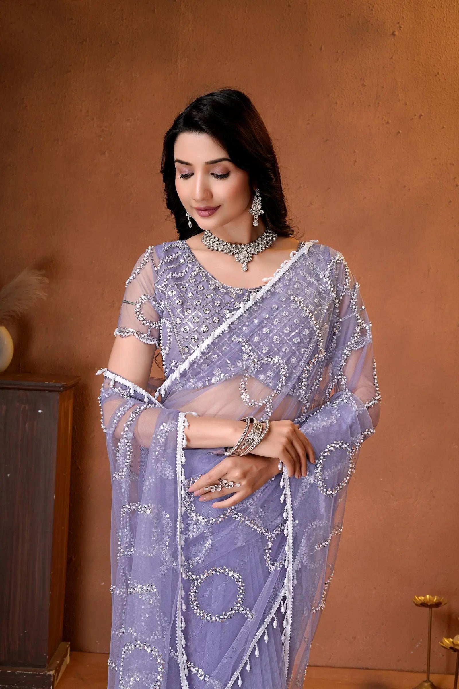 Beautiful Indian saree combining modern elegance, sparkling embroidery, and timeless ethnic fashion with premium finishing.