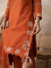 Close-up of floral embroidery work on hem and slit of Light Orange Embroidered Kurti