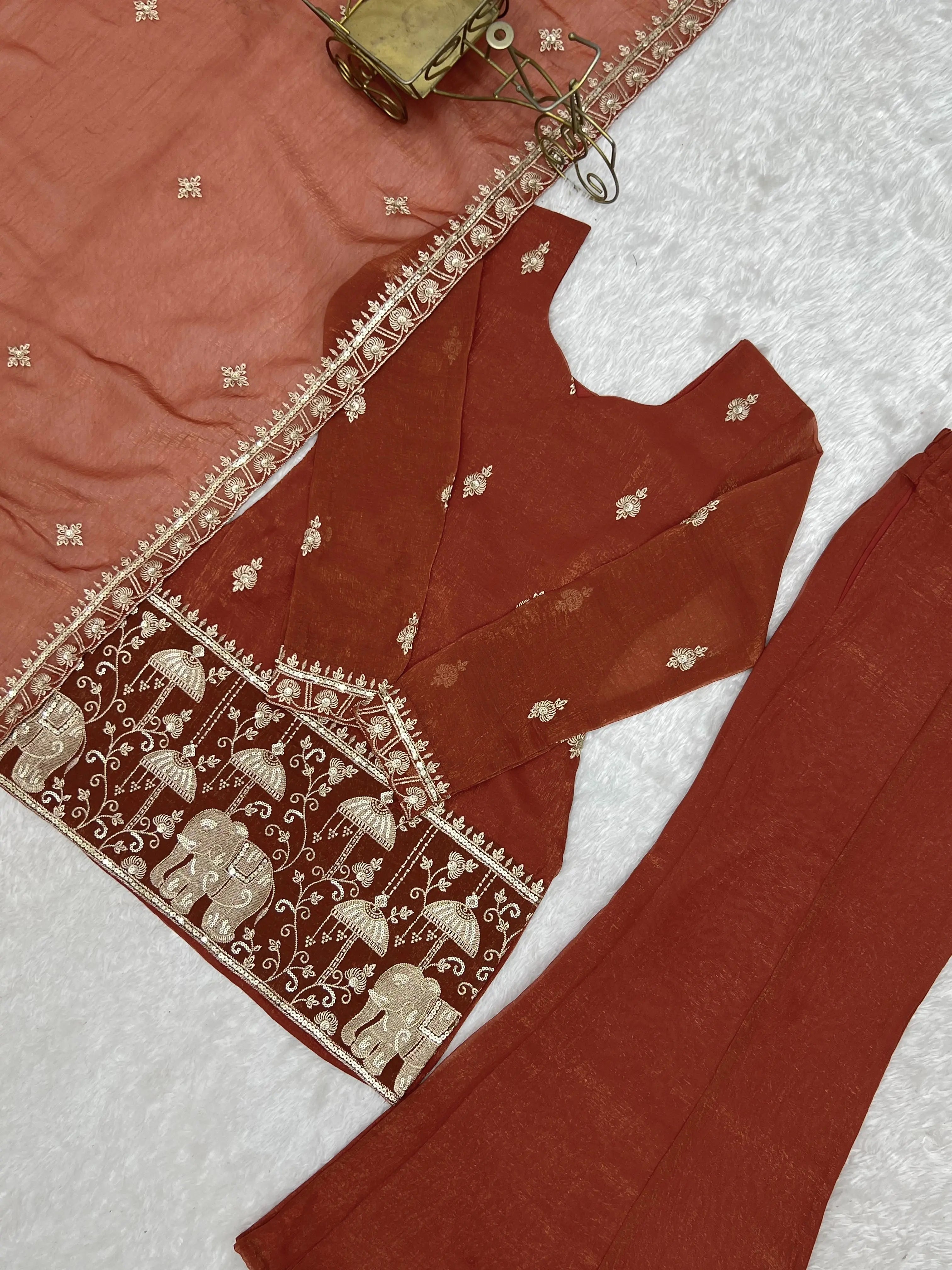Elephant Procession Zari and Sequins Embroidery Detail on Light Orange Suit