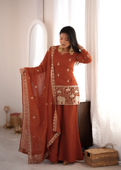 Light Orange Suit Showing Elephant Embroidery Border – Front Detail View
