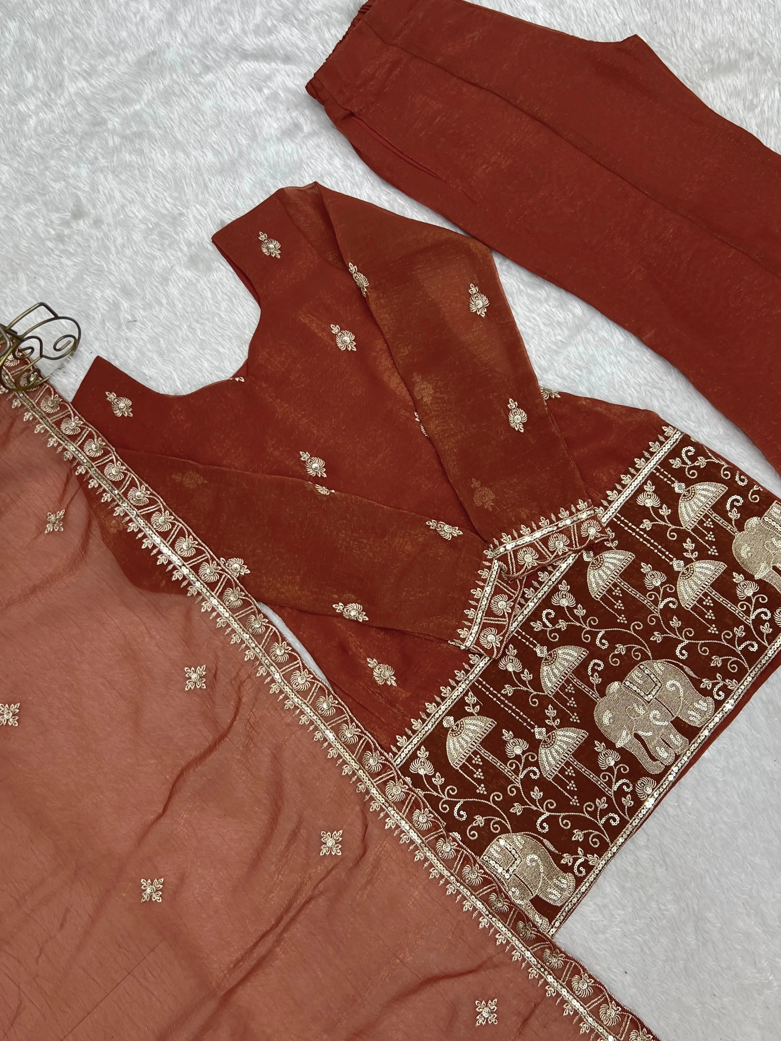 V-Neck and Elephant Embroidery Hem Close Up on Light Orange Crunchy Silk Suit