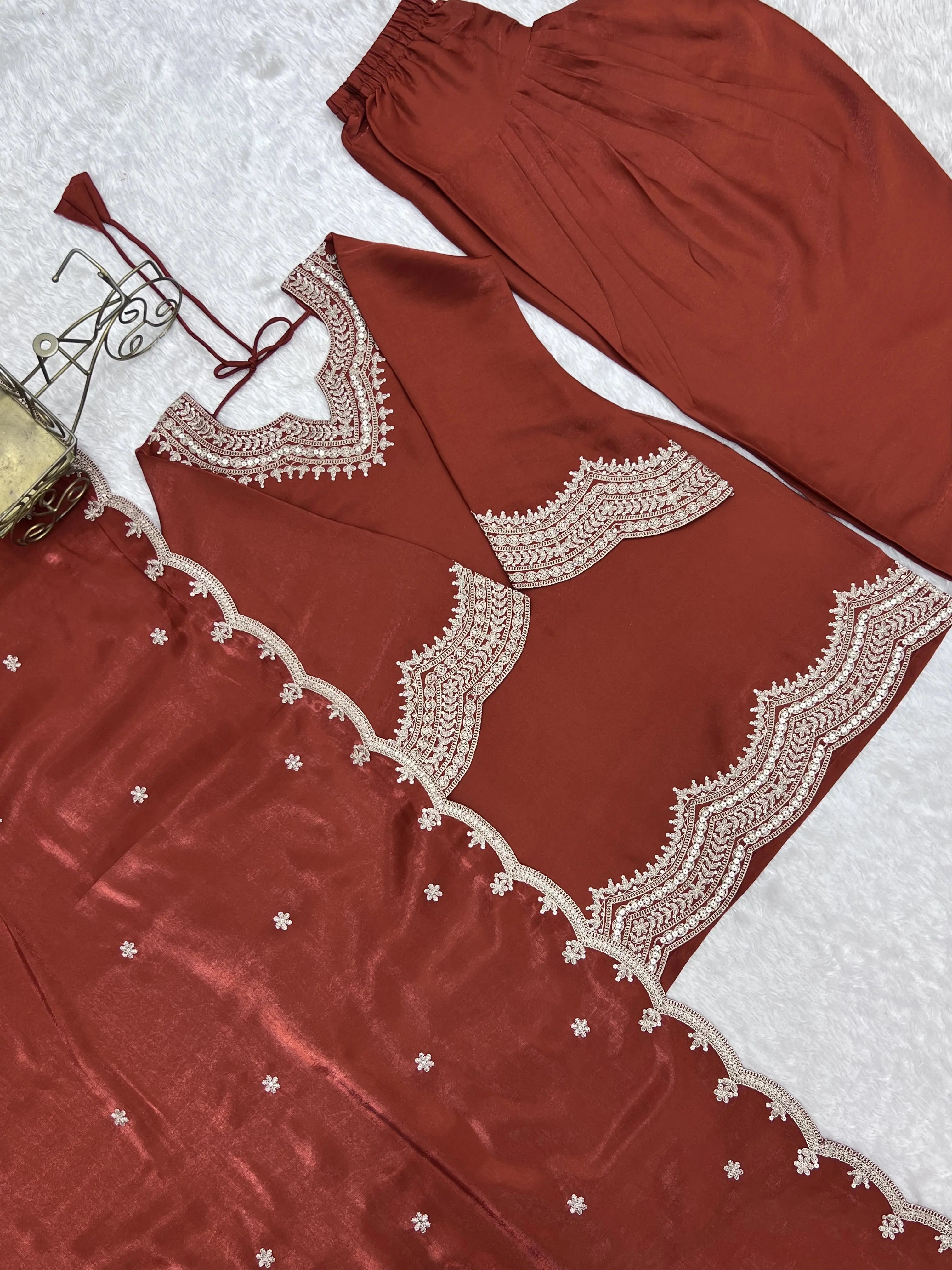 Light Orange Sequins Suit dupatta and kurta flat lay