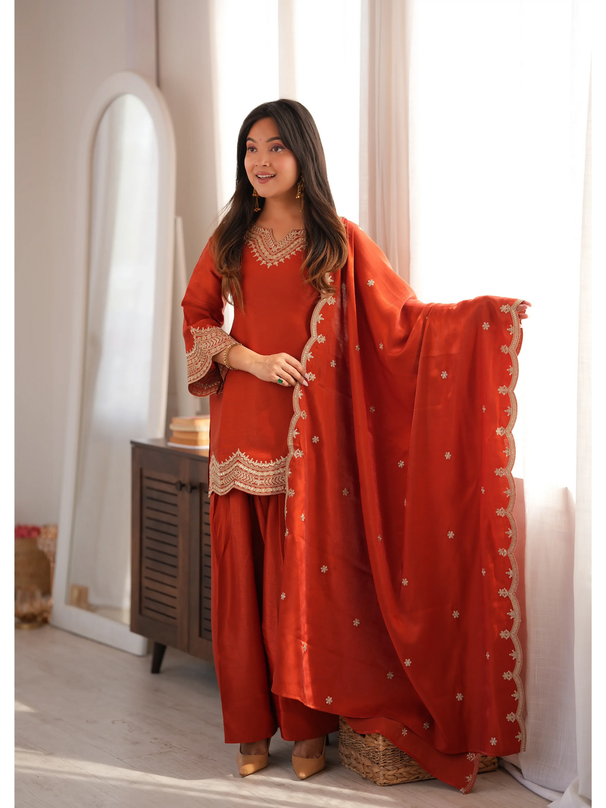 Light Orange Sequins Suit styled with dupatta drape