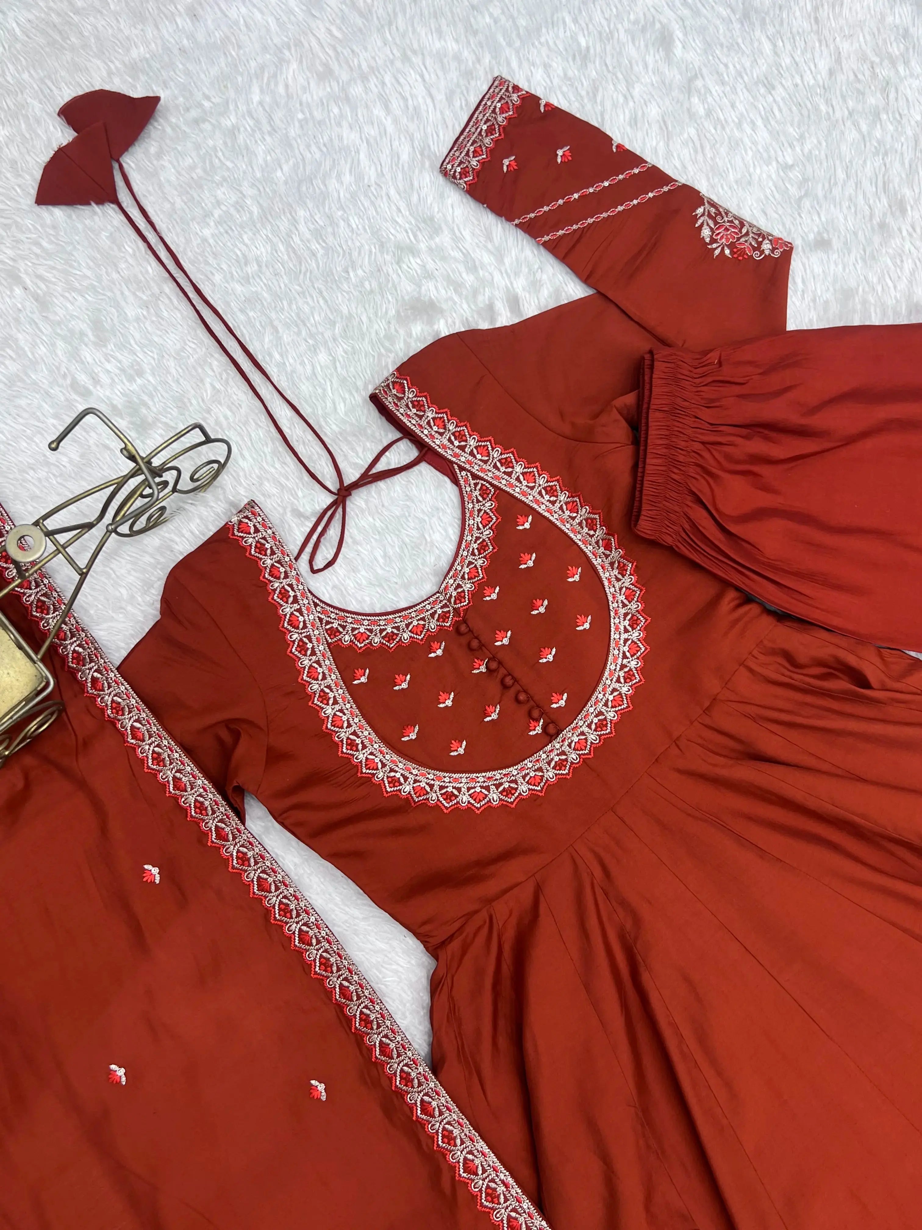 Flat lay close-up of Light Orange Thread Work Anarkali Suit showing neck embroidery