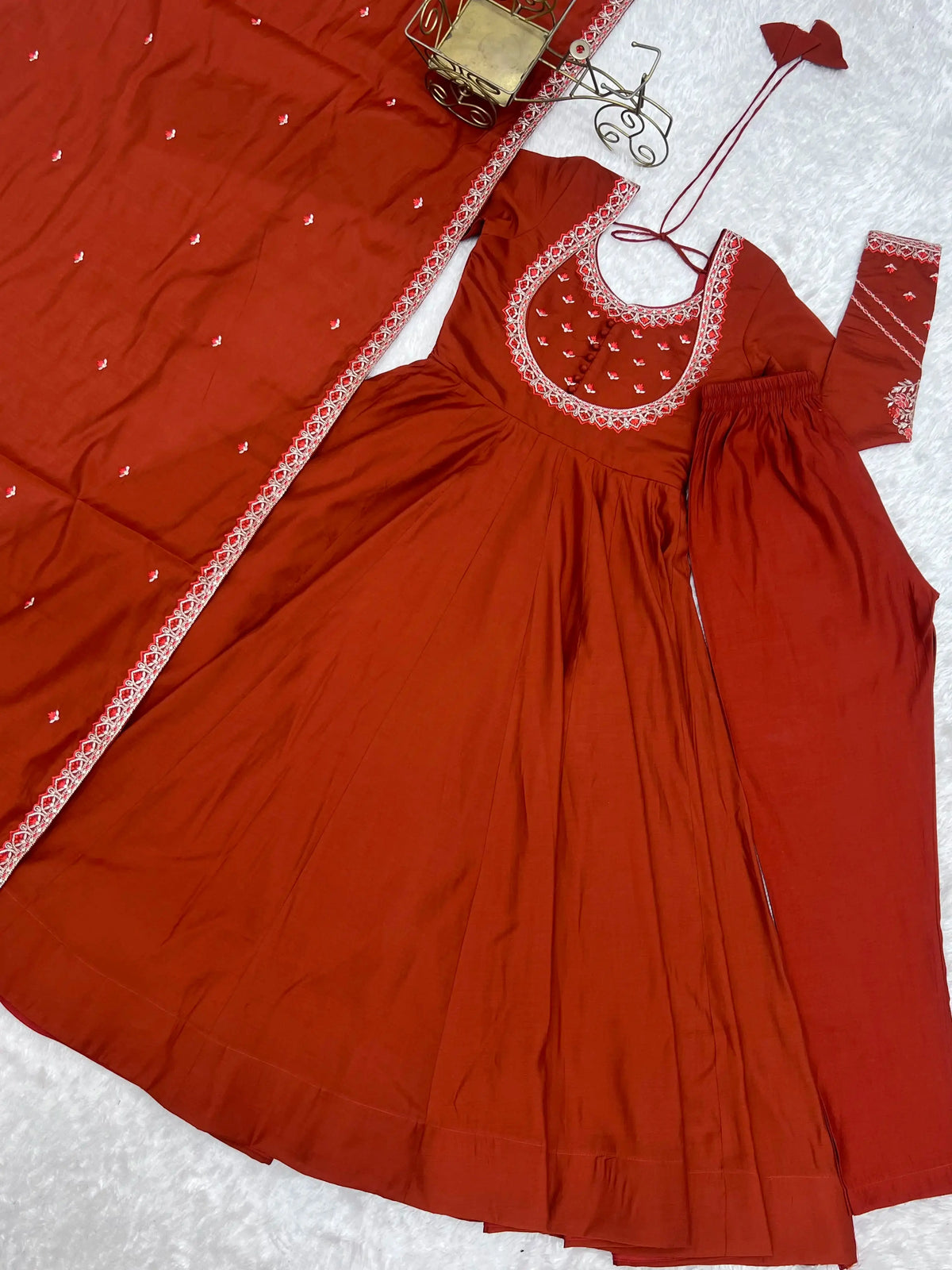 Flat lay of Light Orange Thread Work Anarkali Suit from different angle