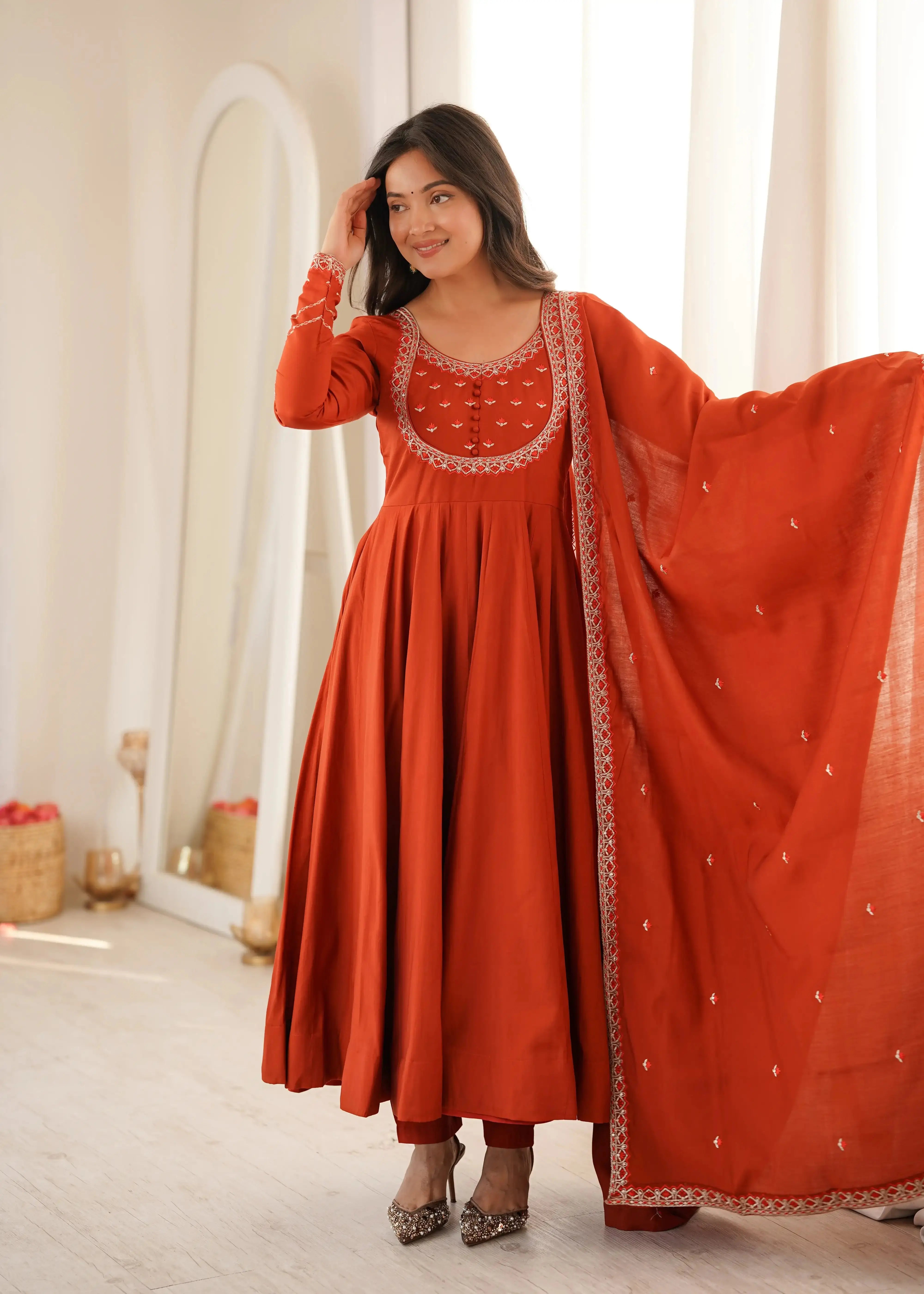 Light Orange Thread Work Anarkali Suit front view model with dupatta extended
