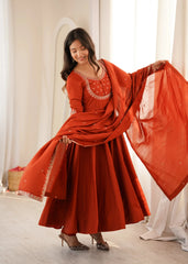 Light Orange Thread Work Anarkali Suit front view model holding dupatta
